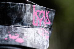 Modern Love Cap pink baseball cap with grey and black graffiti artwork